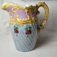 Art nouveau floral decorated barbotine pitcher