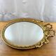 Louis XVI style oval mirror
