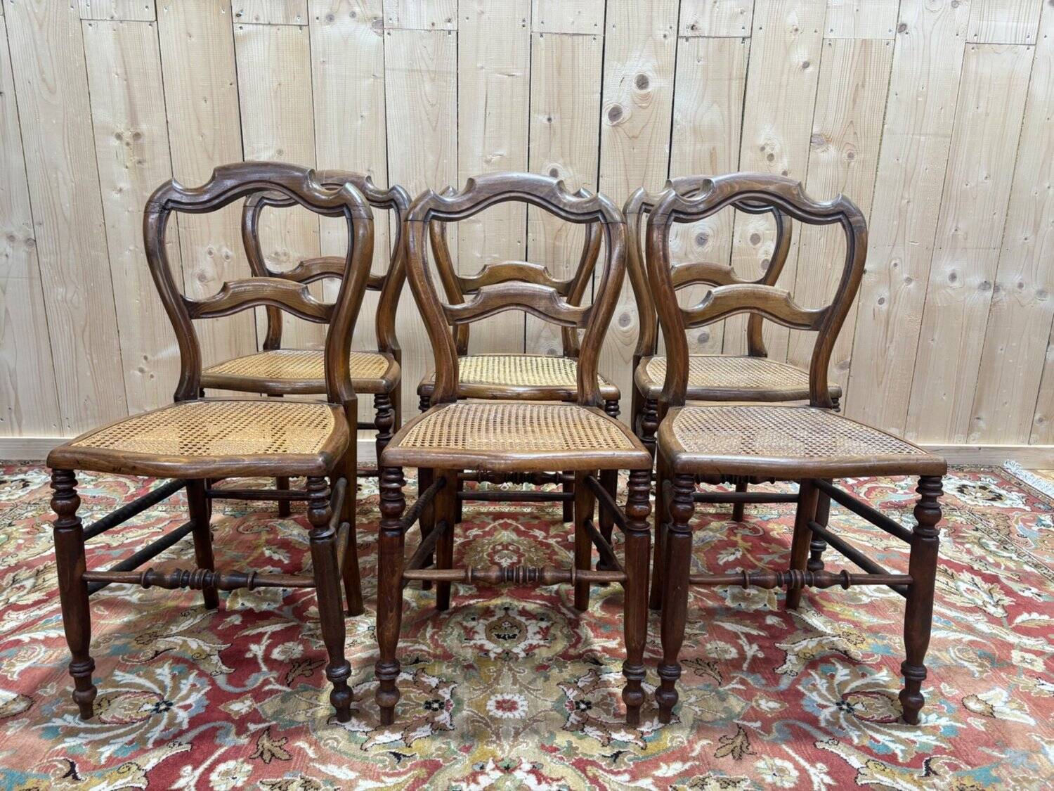 Set of 6 Louis-Philippe caned walnut chairs, 19th century.