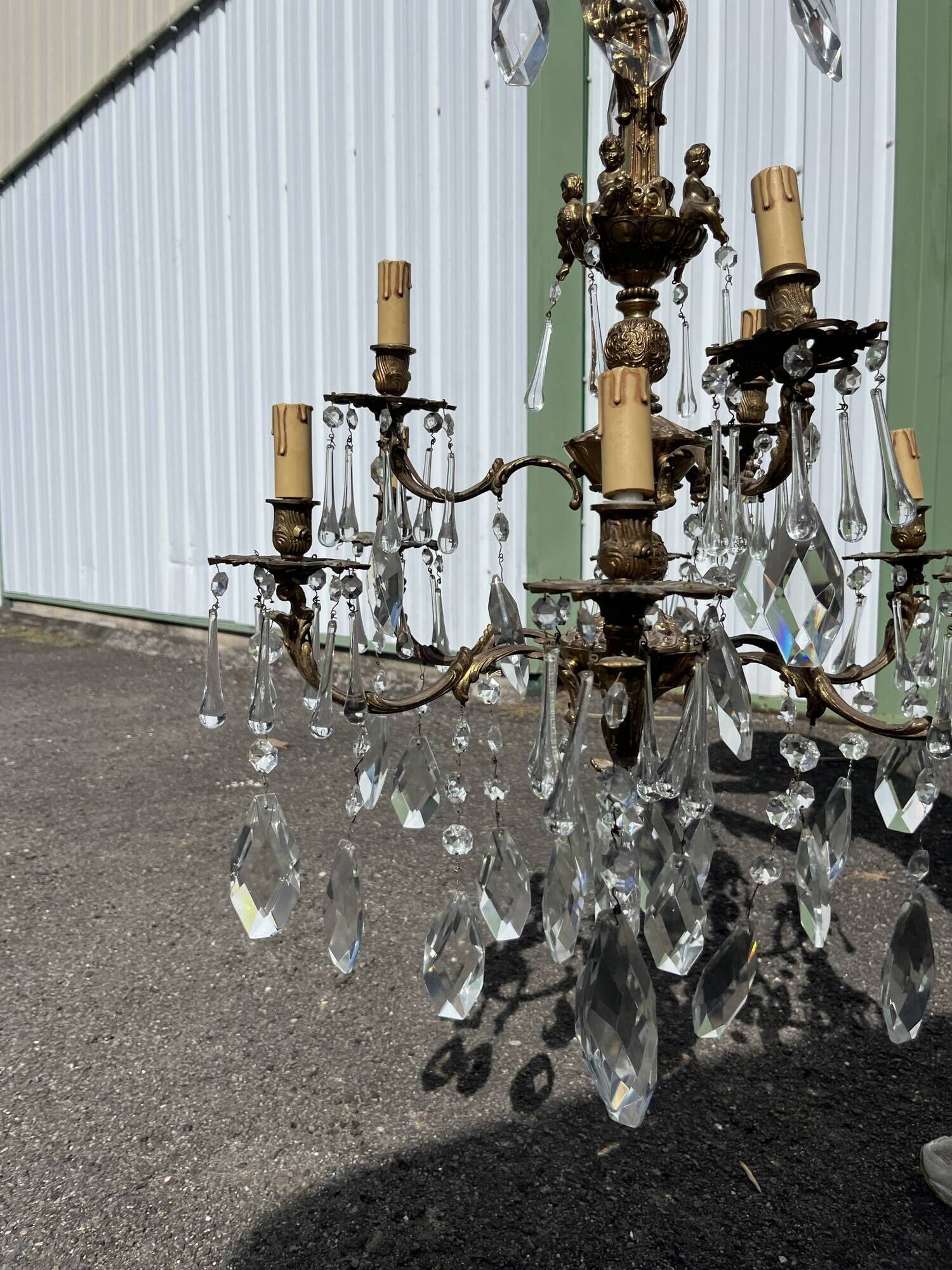 Large antique chandelier with 9 lights, bronze and cut glass pendants, cherubs, style