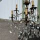 Large antique chandelier with 9 lights, bronze and cut glass pendants, cherubs, style