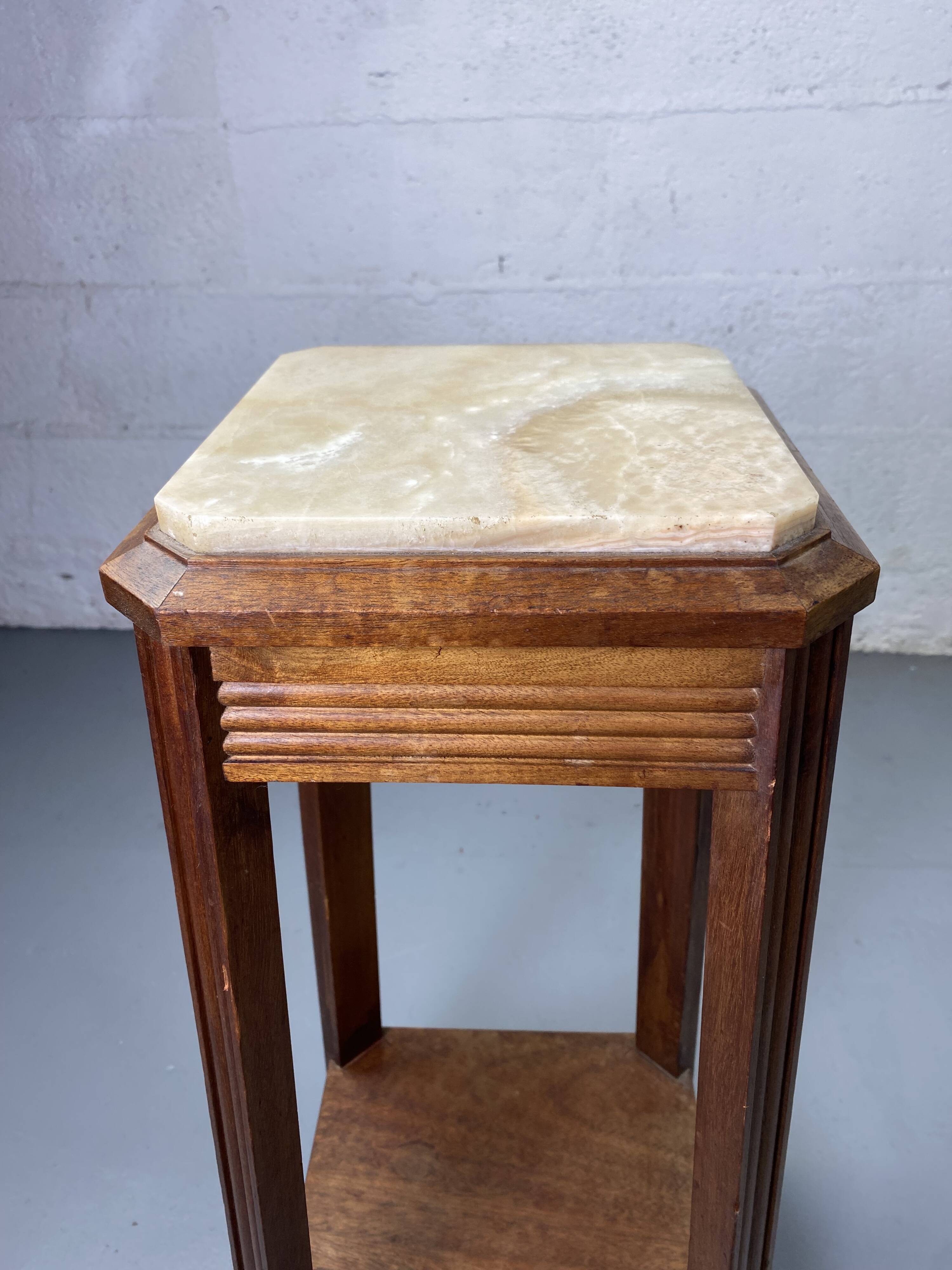 Wooden stool with marble top