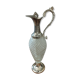 Old ewer in crystal and silver metal