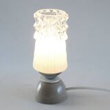Glass and clay lamp