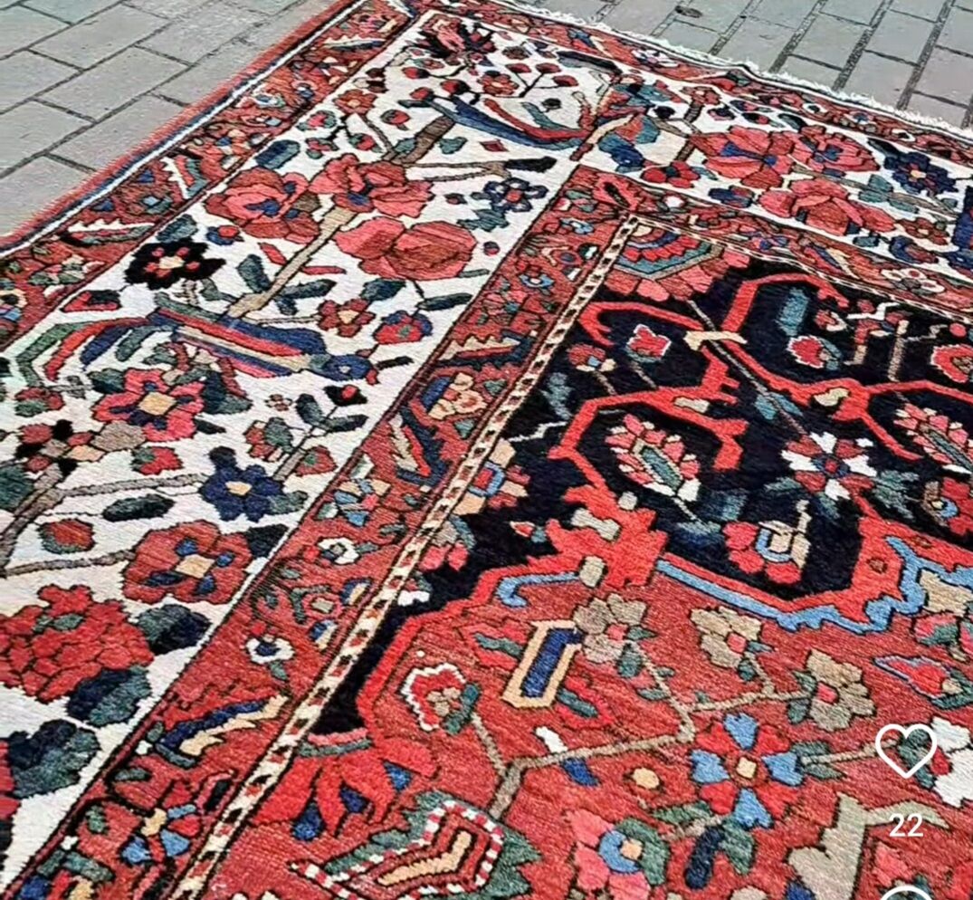 Ancient Persian carpet made of hand-woven wool. Very good condition.