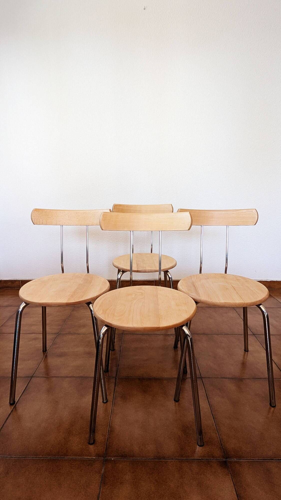 Set of 4 vintage/restored 70s/80s wooden and chrome bistro chairs.
