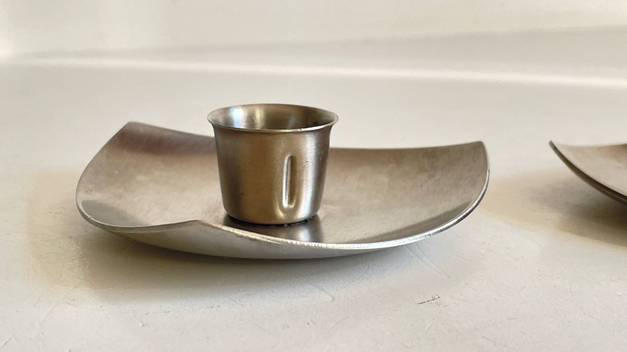 Vintage brushed metal geometric candle holders