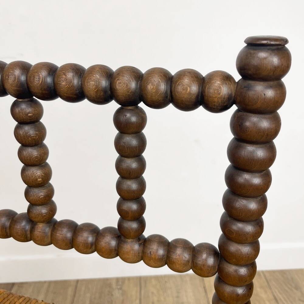 Old wooden ball fireside chair