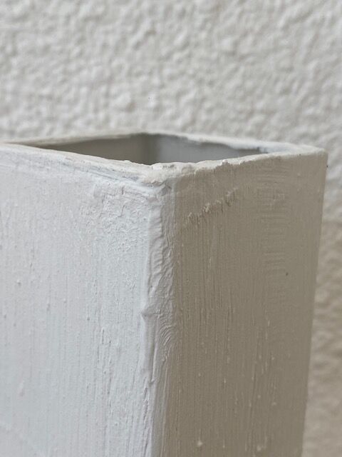 Trio of white vases