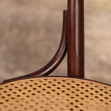 Curved wooden chair and tuna-