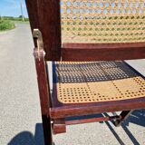 Set of 2 folding chairs in wood and cane.