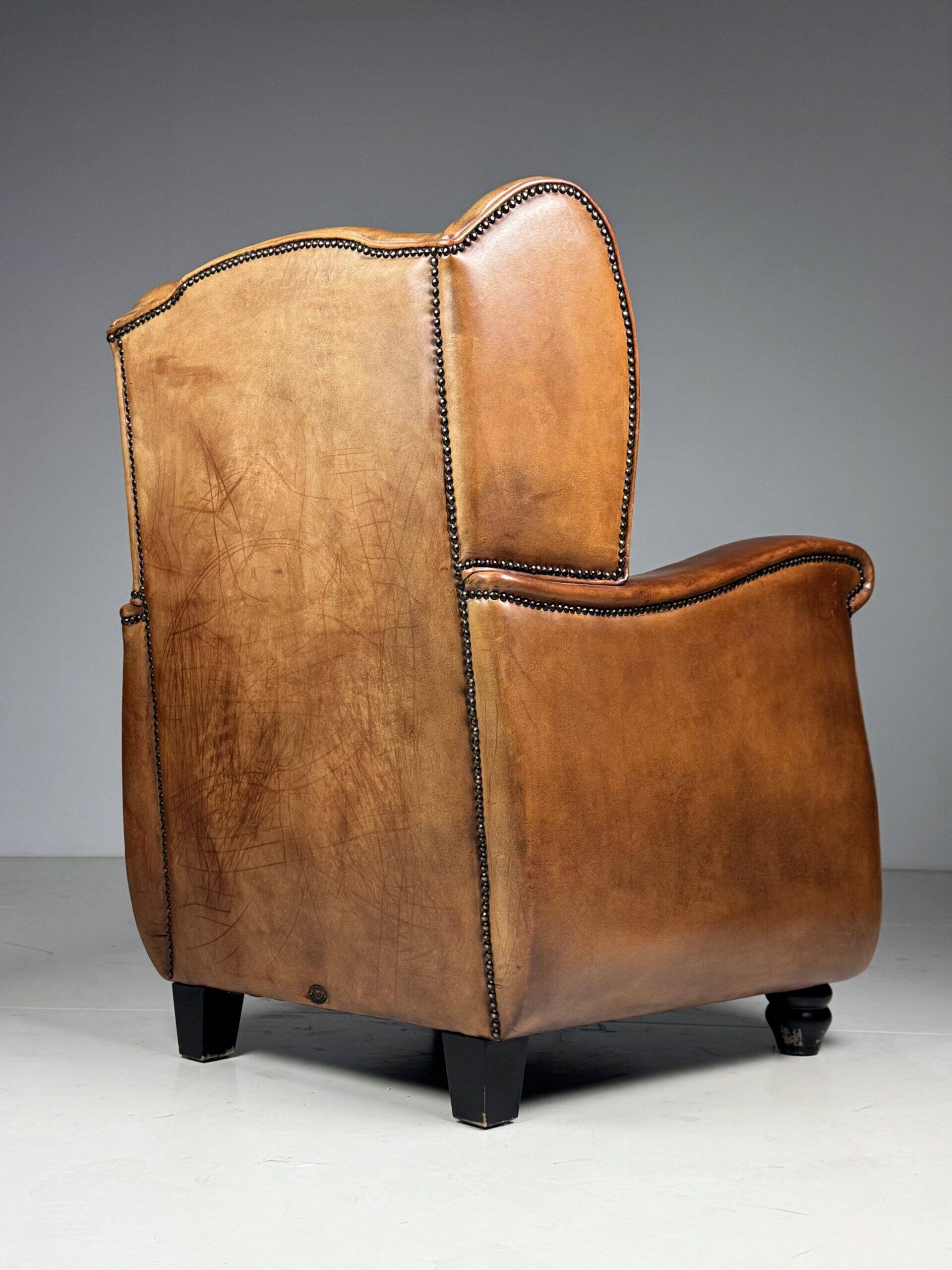 Set of 2 sheepskin club armchairs