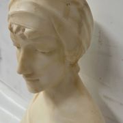 Sculpted marble group of a young woman's bust, 20th century.