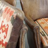 Set of 2 nice, subtle cowhide armchairs with reversible Kelim seat cushions