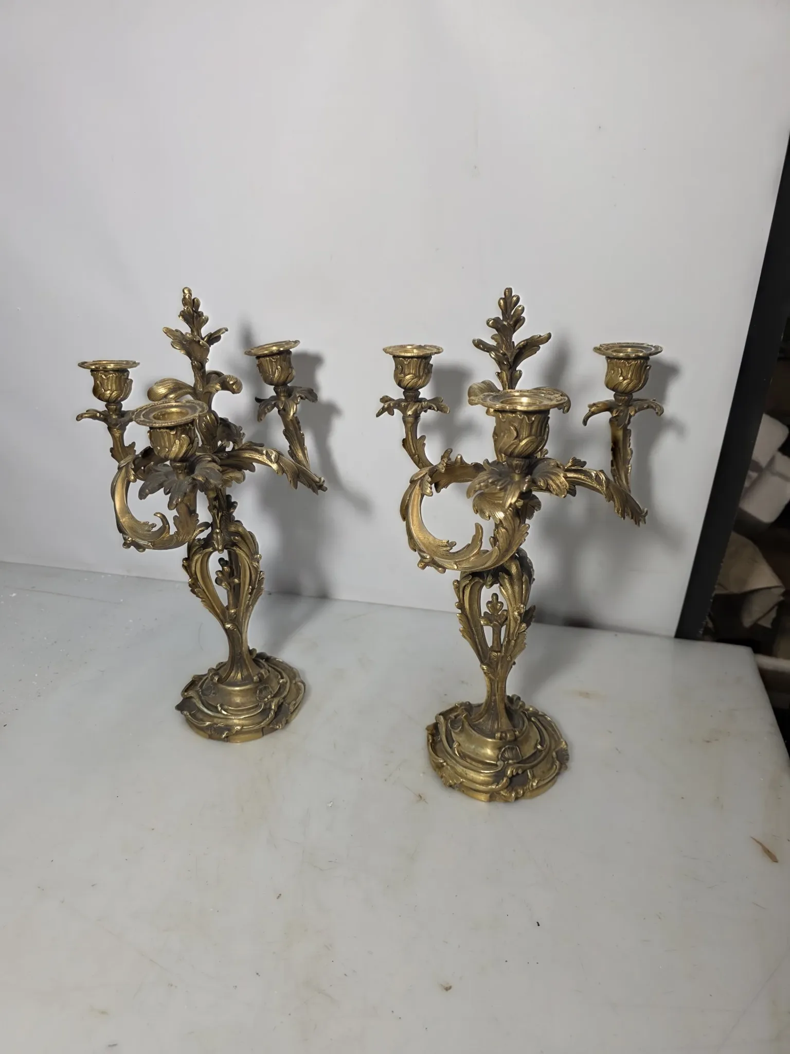 Pair of Louis XV style bronze candlesticks from the 19th century.