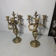 Pair of Louis XV style bronze candlesticks from the 19th century.