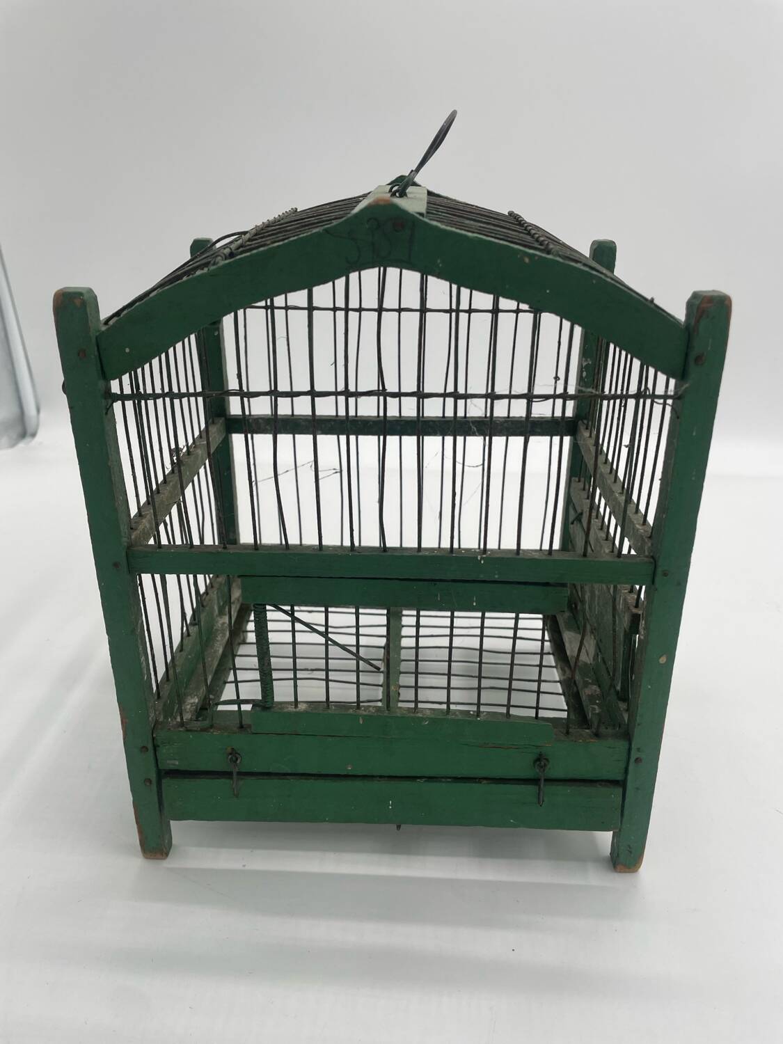 Ancienne petite cage à oiseaux verte en bois