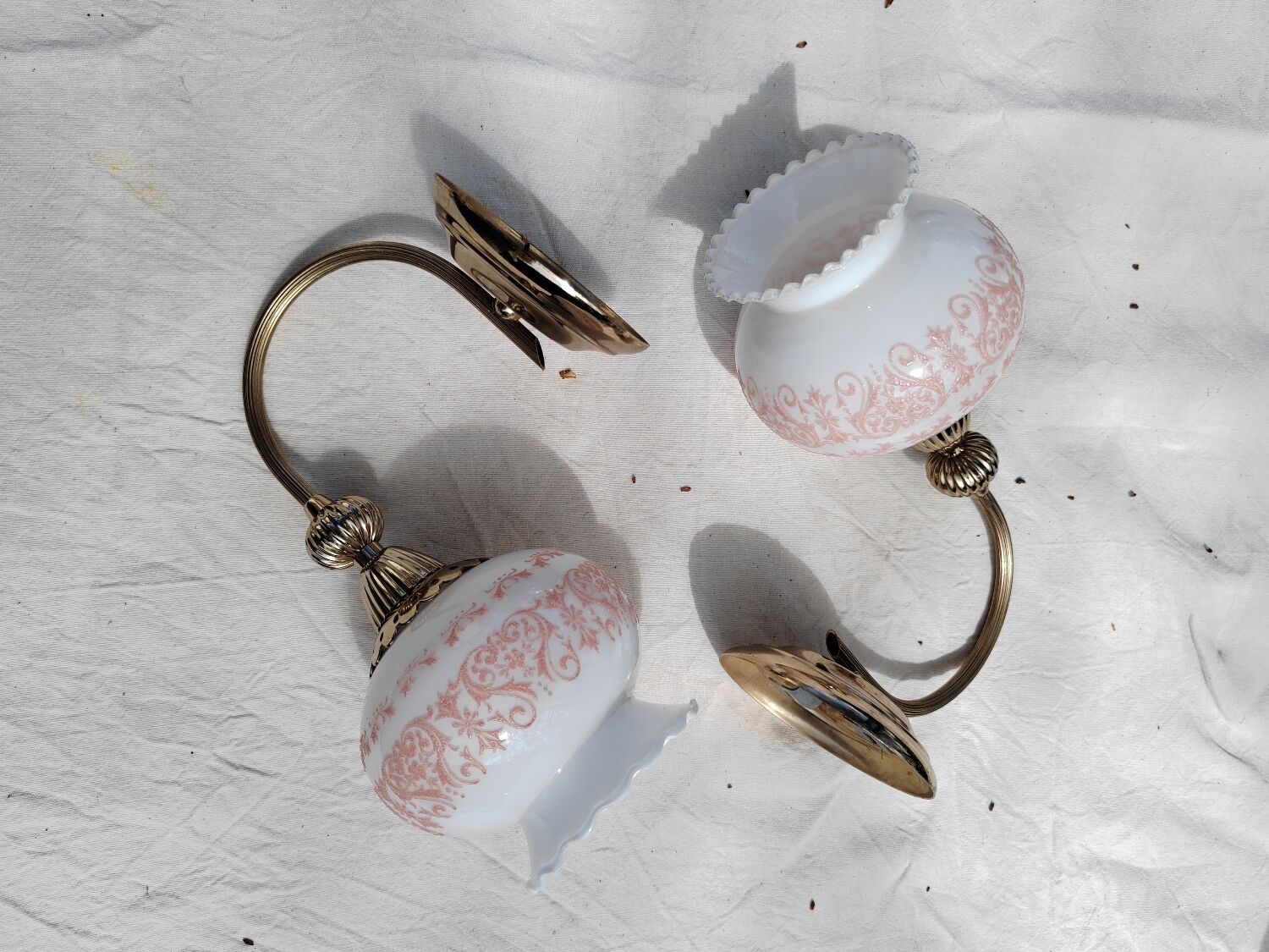 Pair of wall sconces with floral lampshades