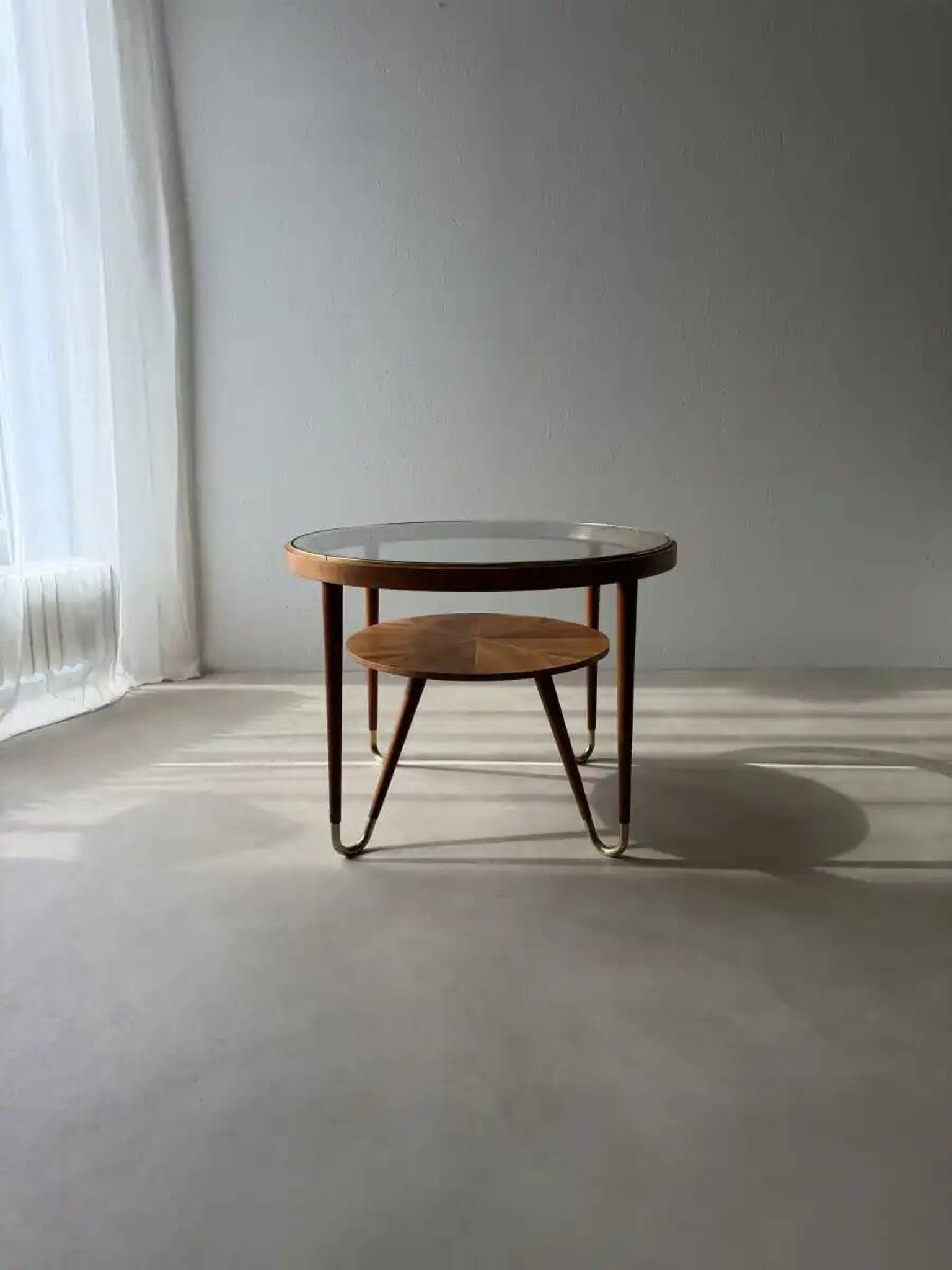 Round walnut coffee table with glass by Ilse Möbel
