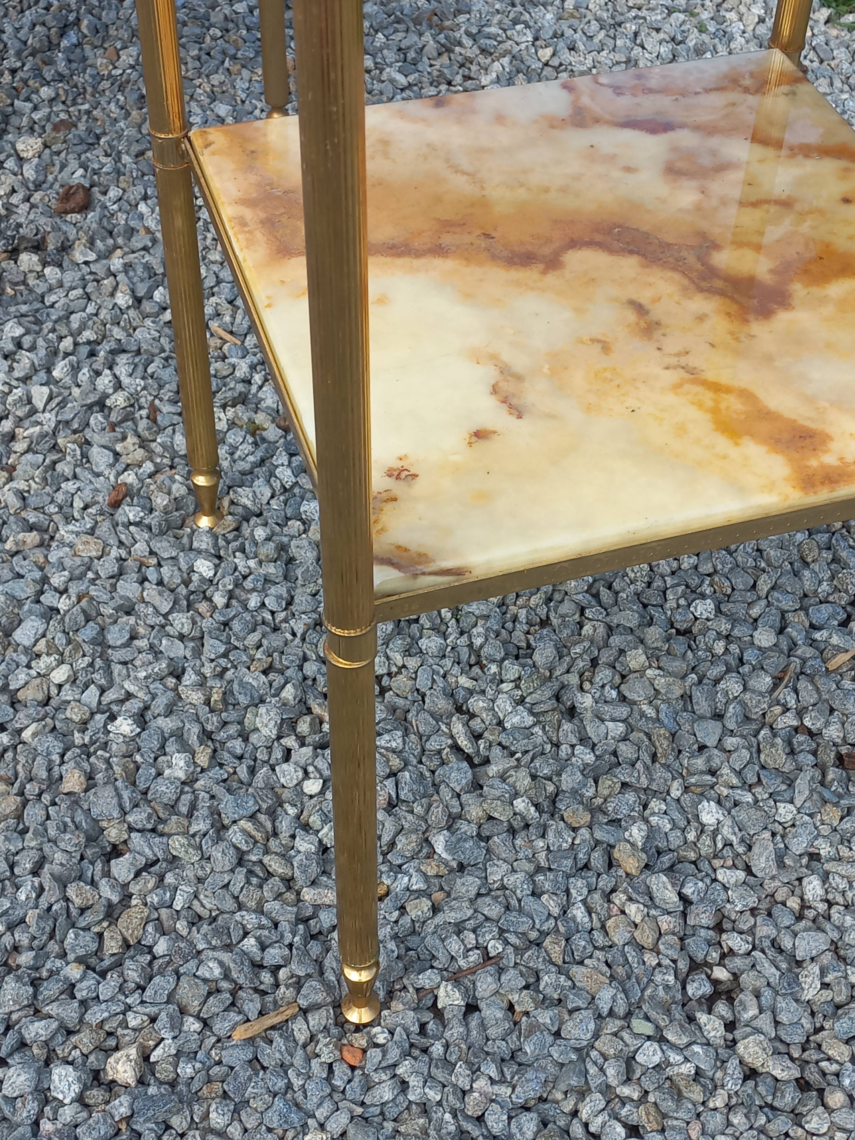 Pair of neoclassical side tables in bronze, brass, marble, and o.