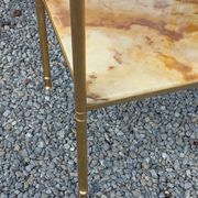 Pair of neoclassical side tables in bronze, brass, marble, and o.