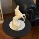 White rearing horse statuette