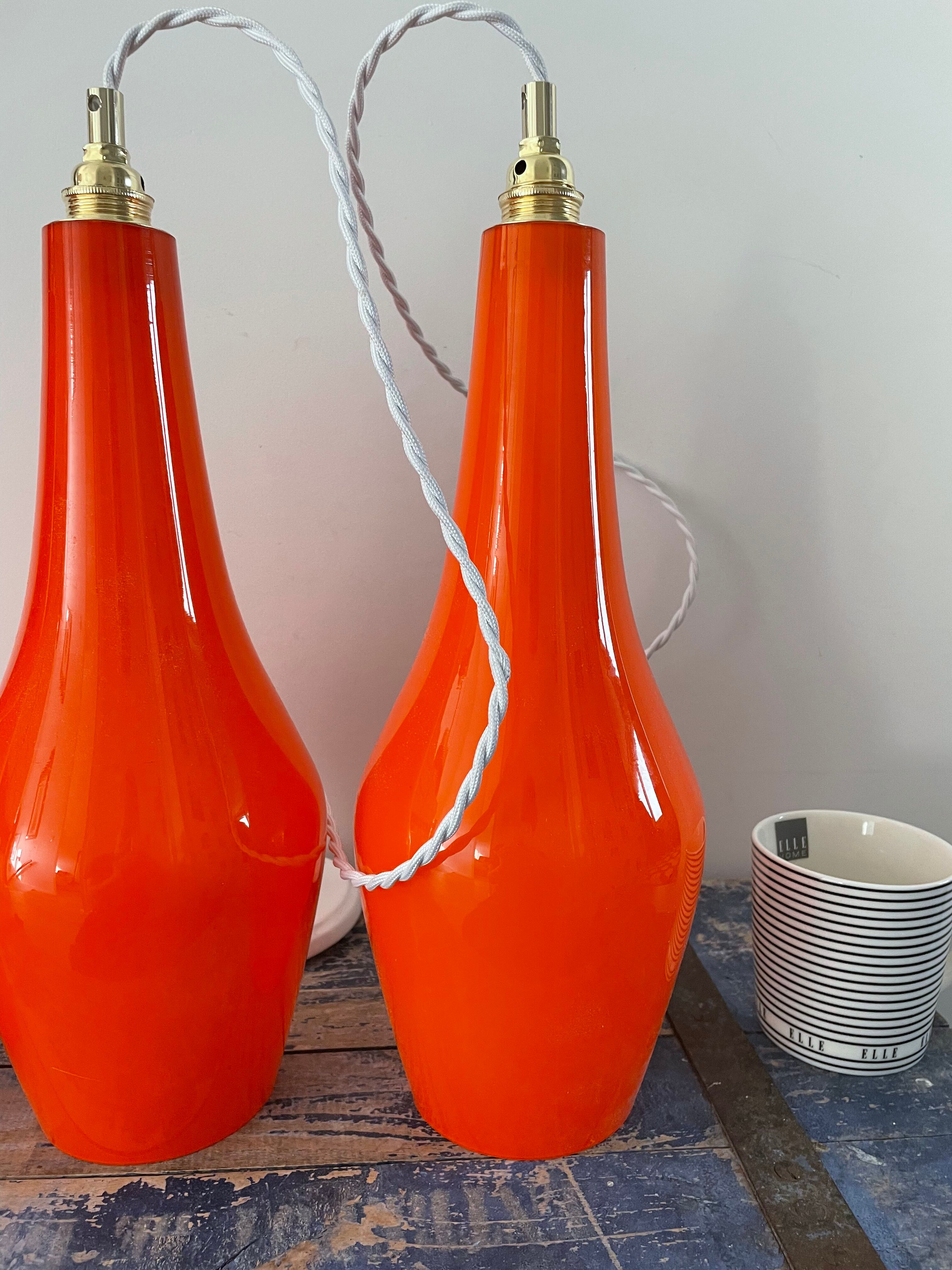 Set of three new electrified orange vintage pendant lamps