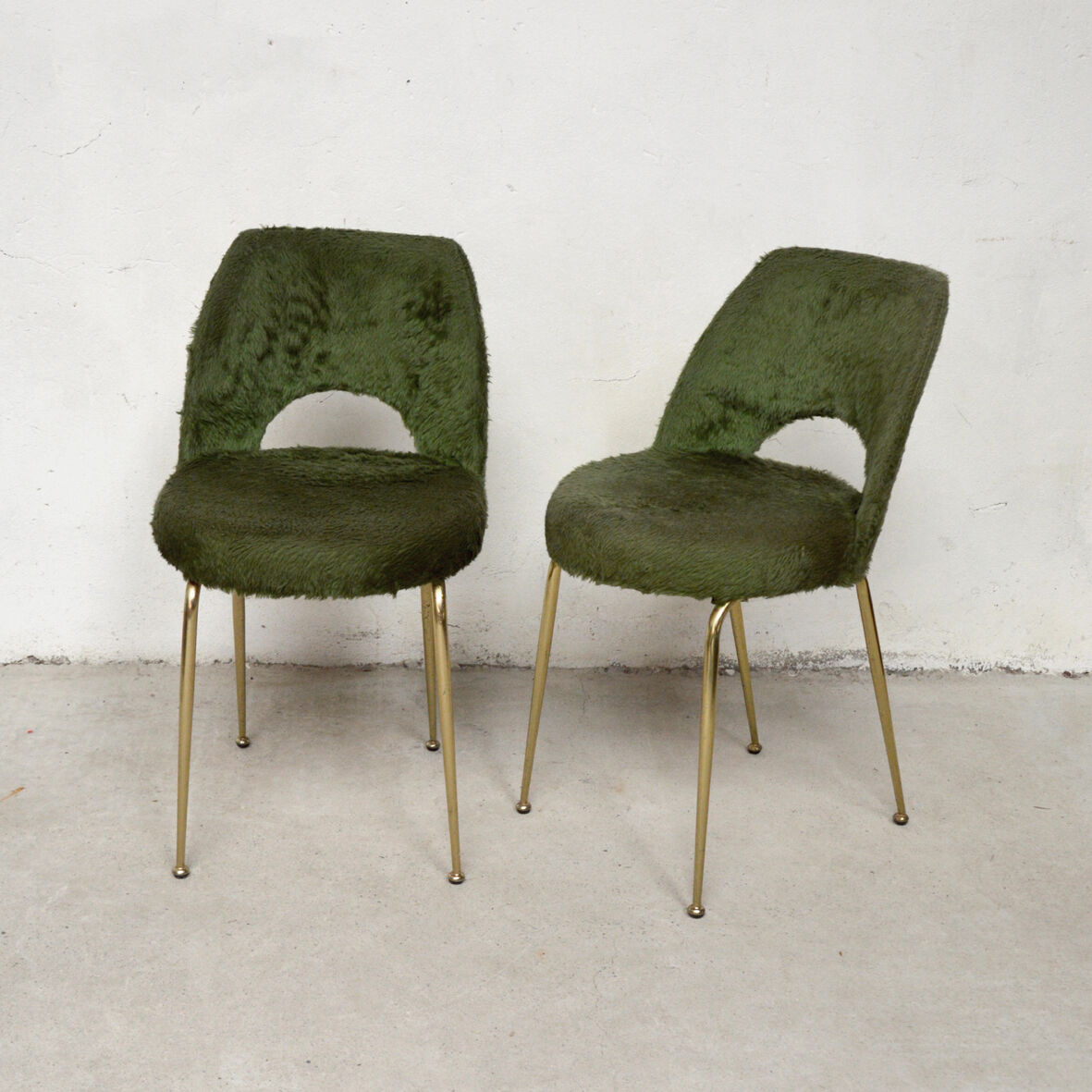 Pair of green Pelfran chairs