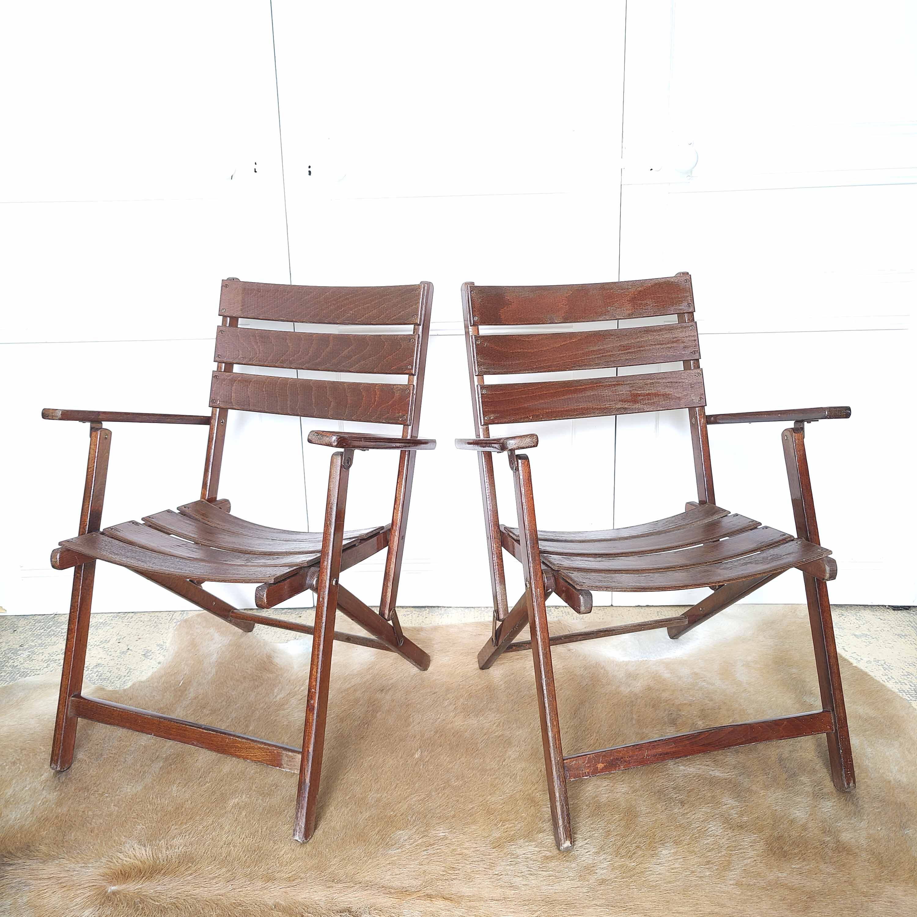 Pair of folding wooden armchairs