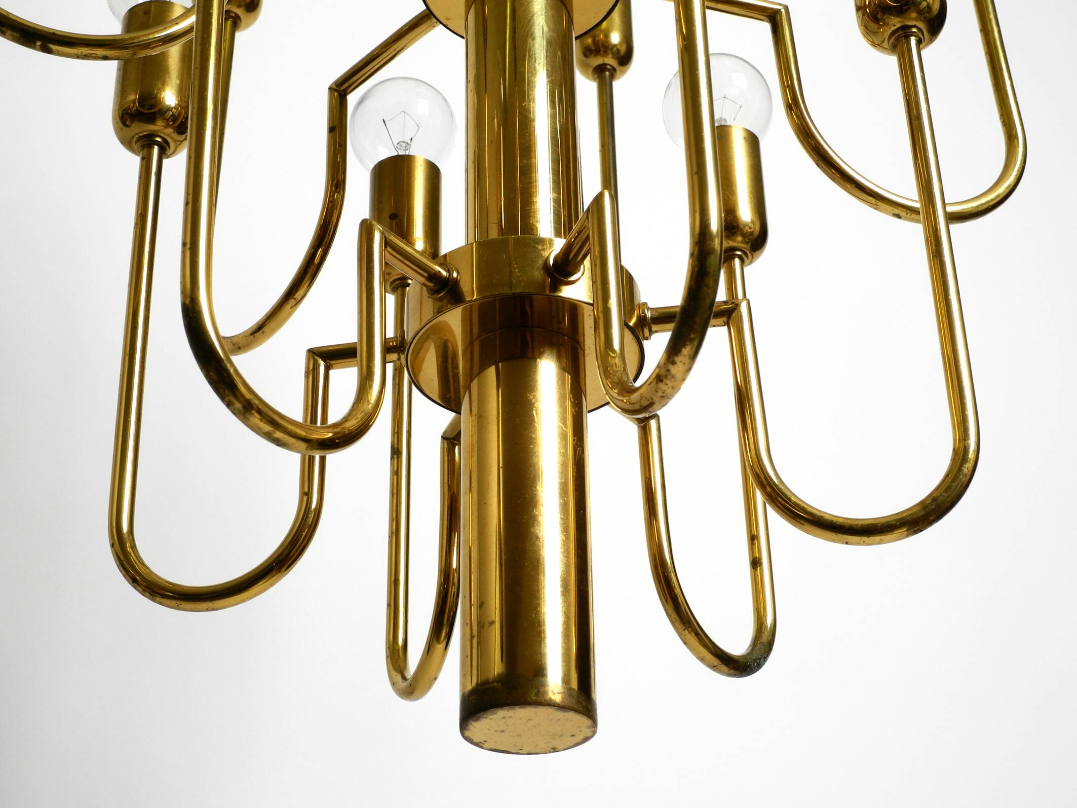 Three staged 18 arm Mid Century brass chandelier with a long brass rod