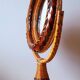 Woven wicker standing mirror