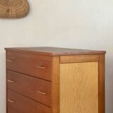 Vintage 1960s chest of drawers with covered handles.