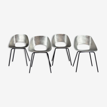 Four aluminium chairs by Pierre Guariche