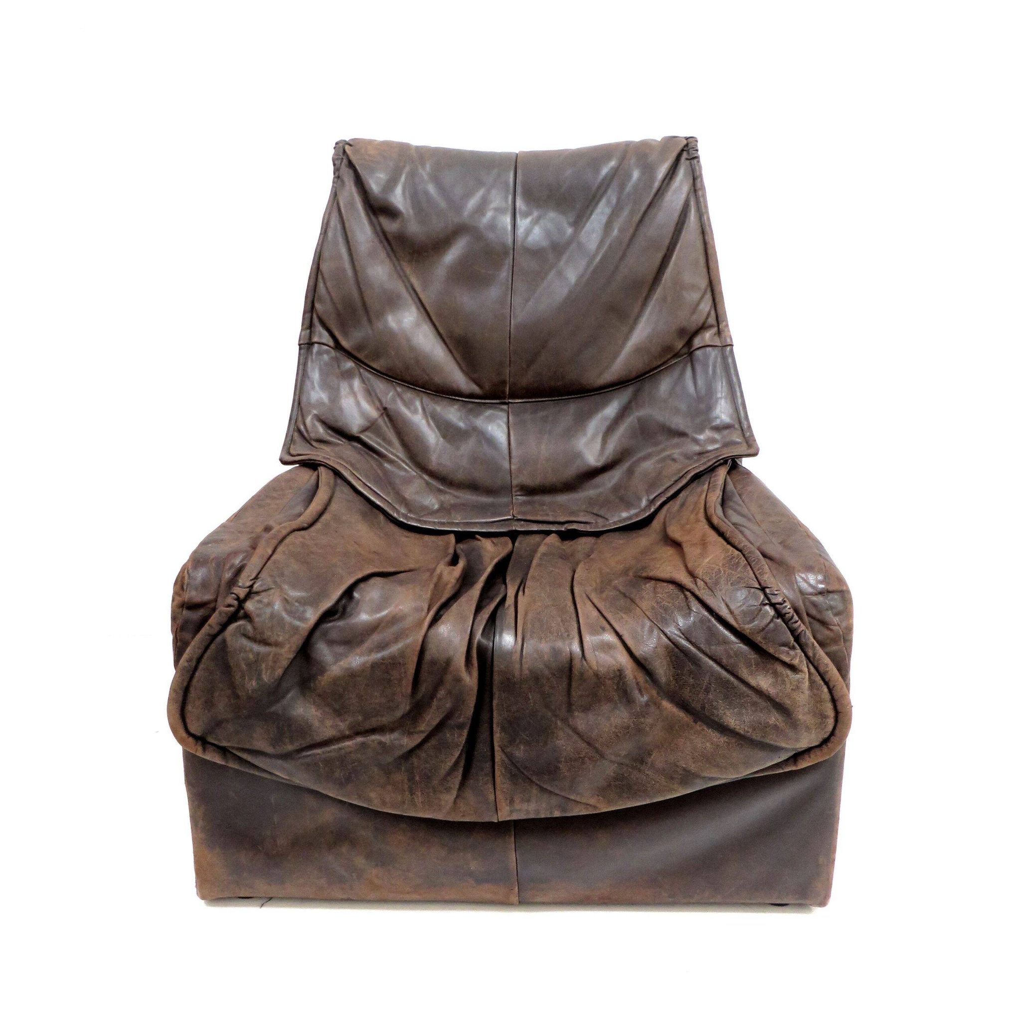 Vintage leather Brutalist armchairs