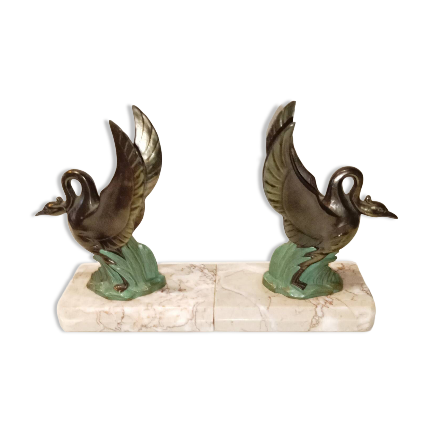 Art Deco bookends with metal swans, double patina and marble base.