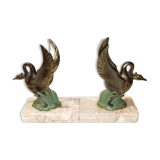 Art Deco bookends with metal swans, double patina and marble base.