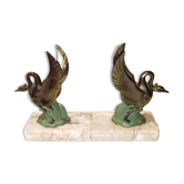Art Deco bookends with metal swans, double patina and marble base.