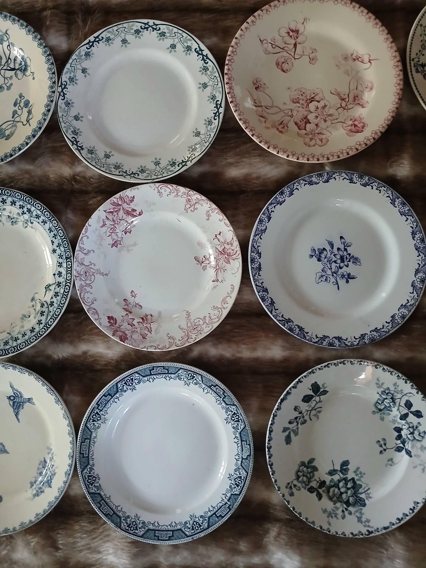 20 mismatched antique flat plates in ironstone