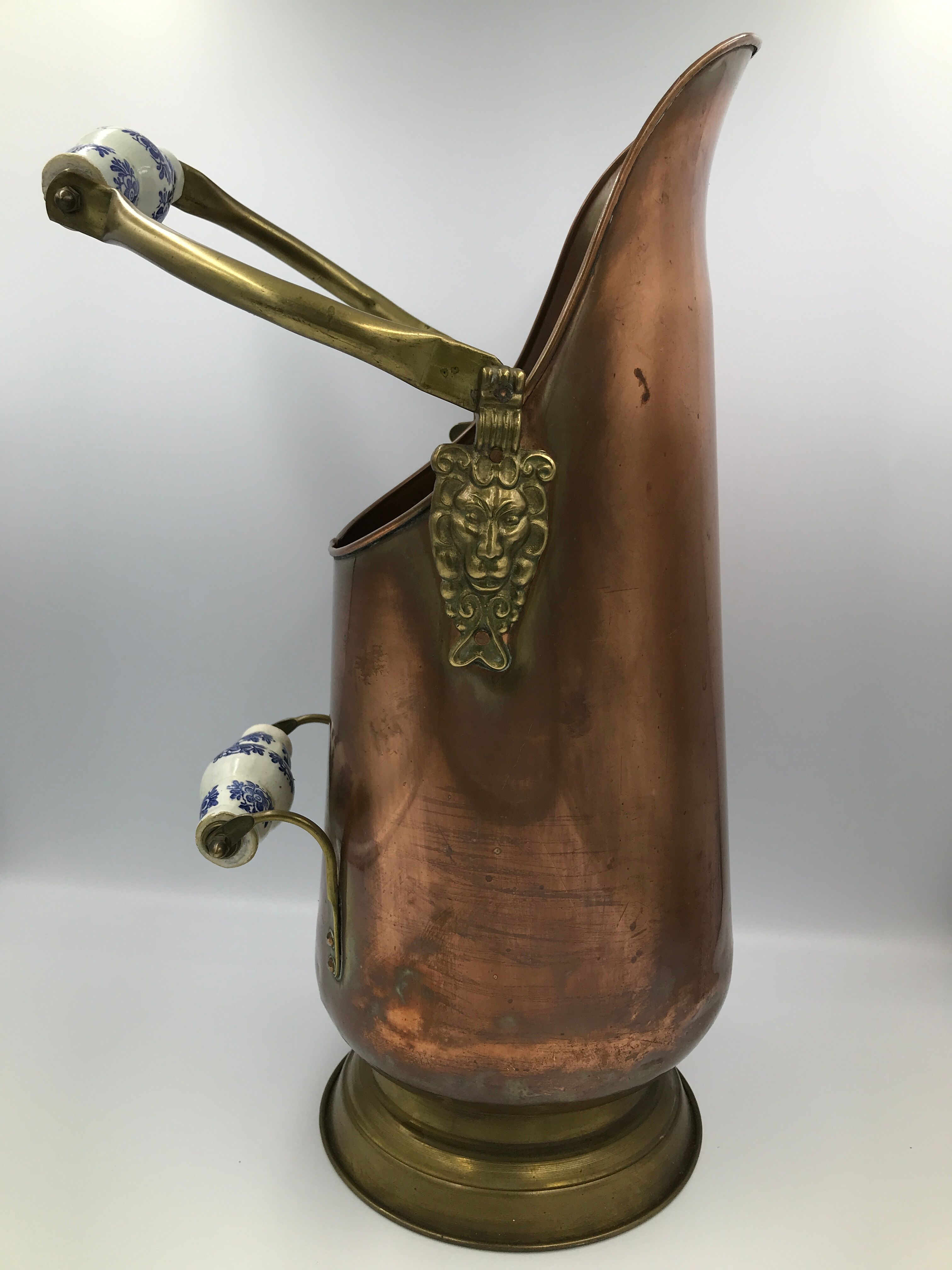Copper umbrella holder and vintage porcelain handles