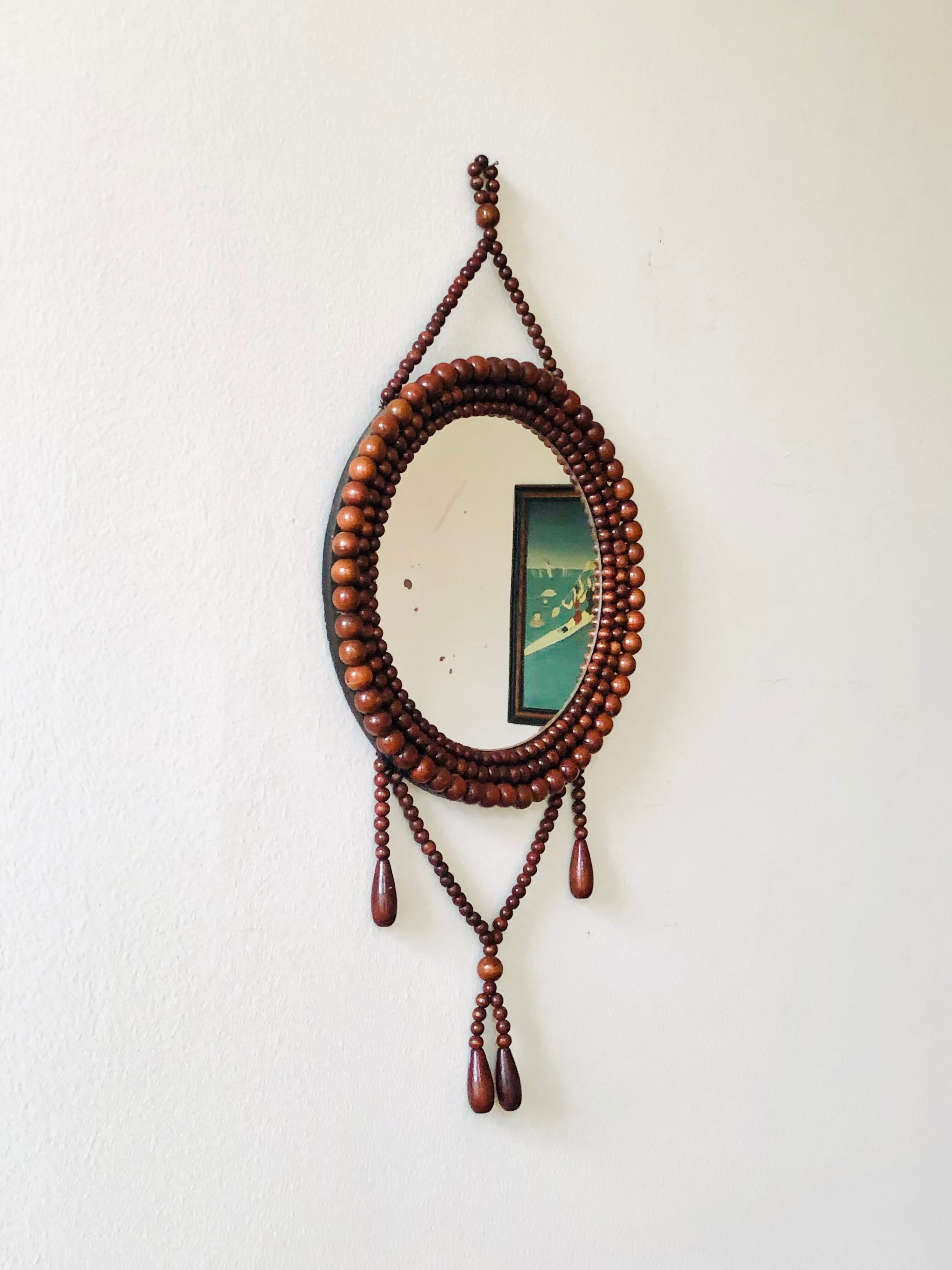 Miroir mural vintage en perles de bois