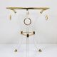 Table basse Tripode style Maison Jansen en lucite et métal doré
