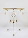 Tripod coffee table in Maison Jansen style in lucite and gold metal.