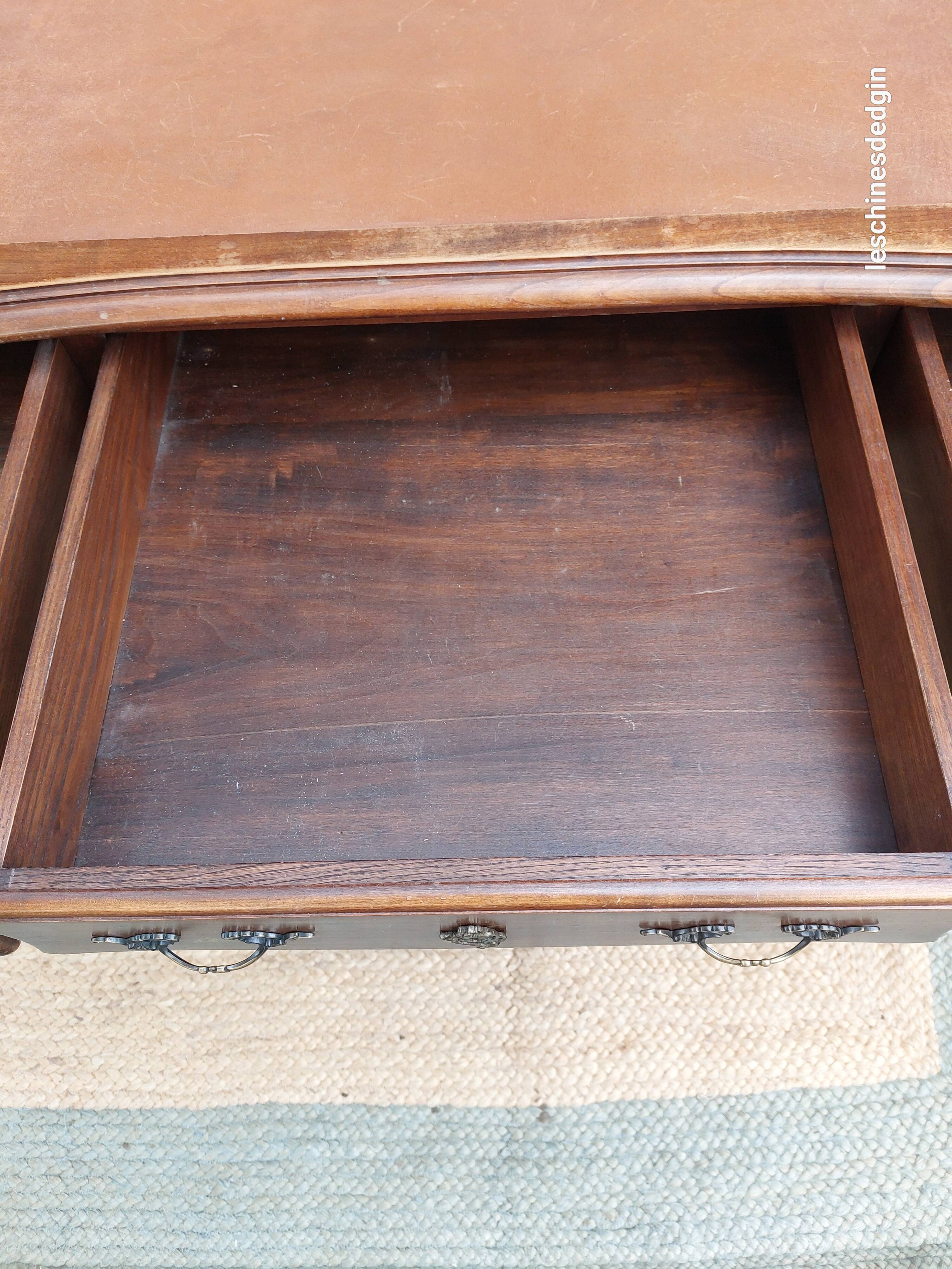 Louis XV style desk in wood, with a brown leather top.
