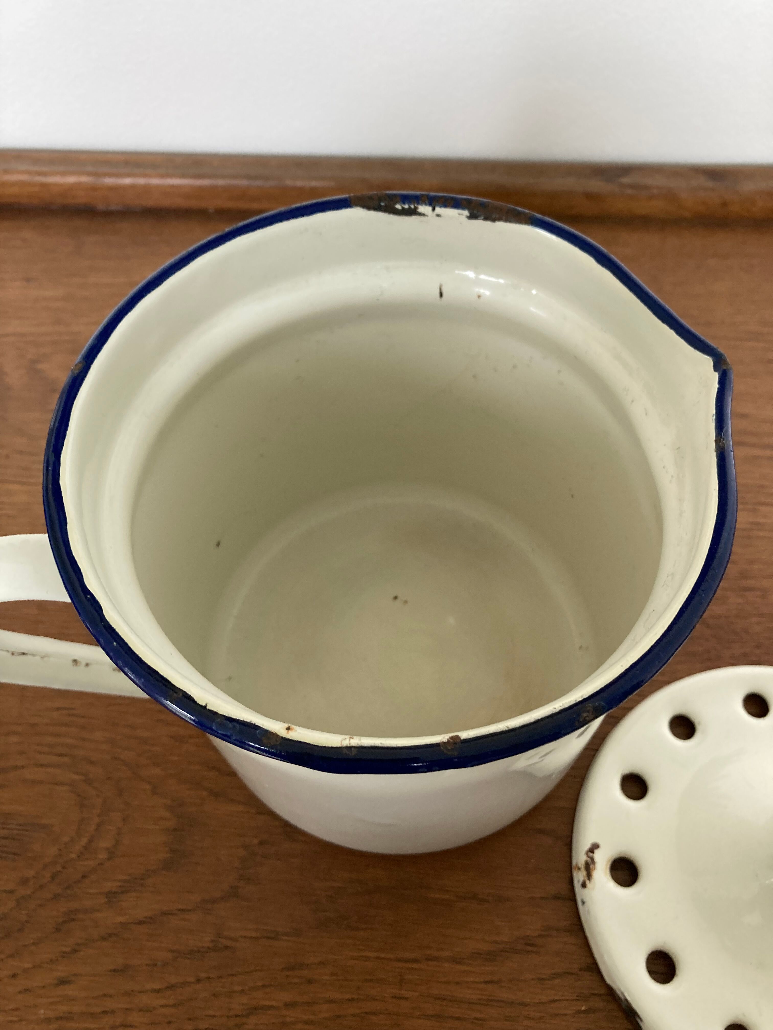 Vintage enamelled iron pitcher