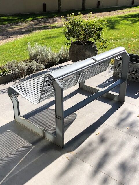 Perforated metal garden bench