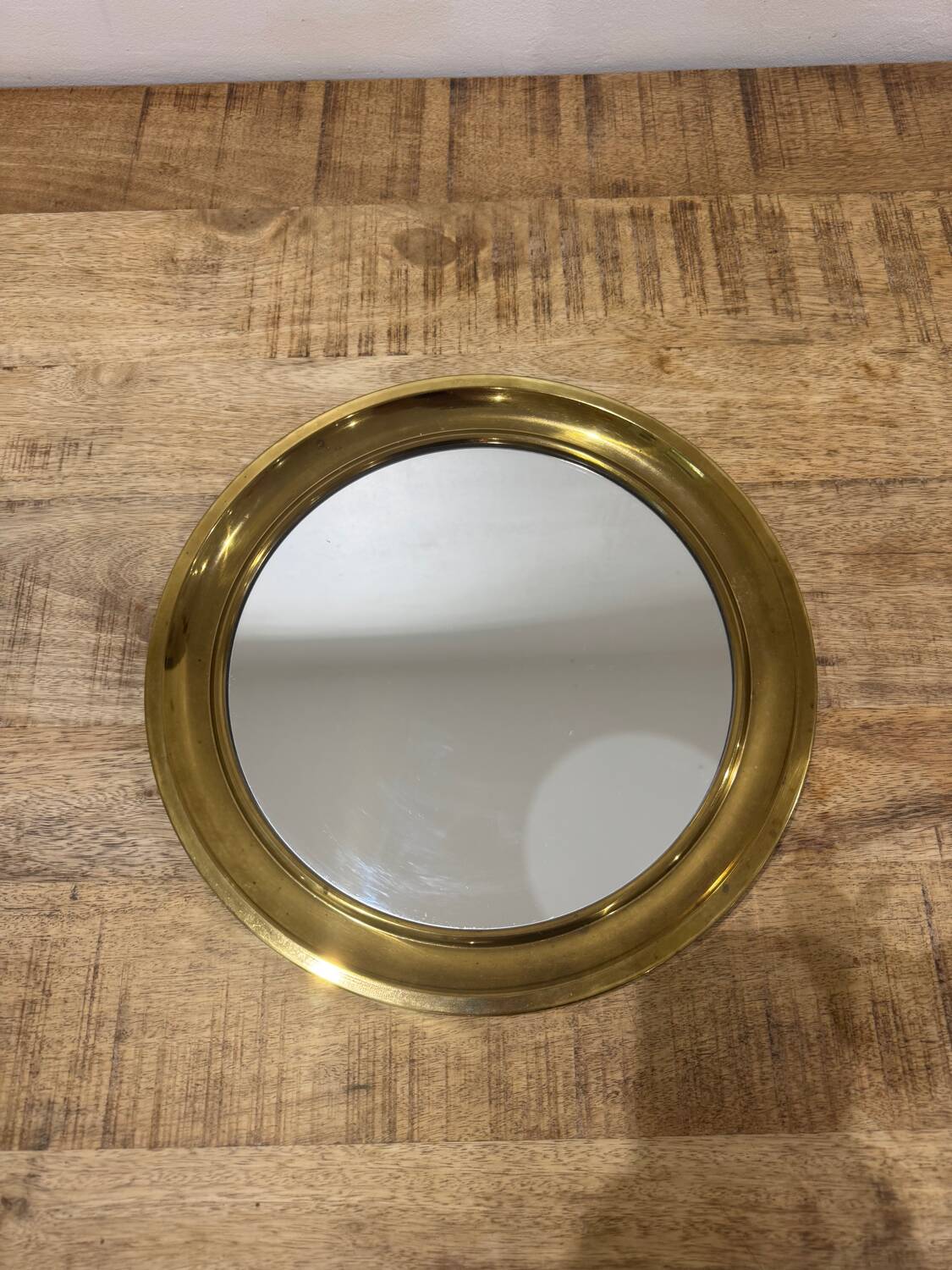 Golden round mirror