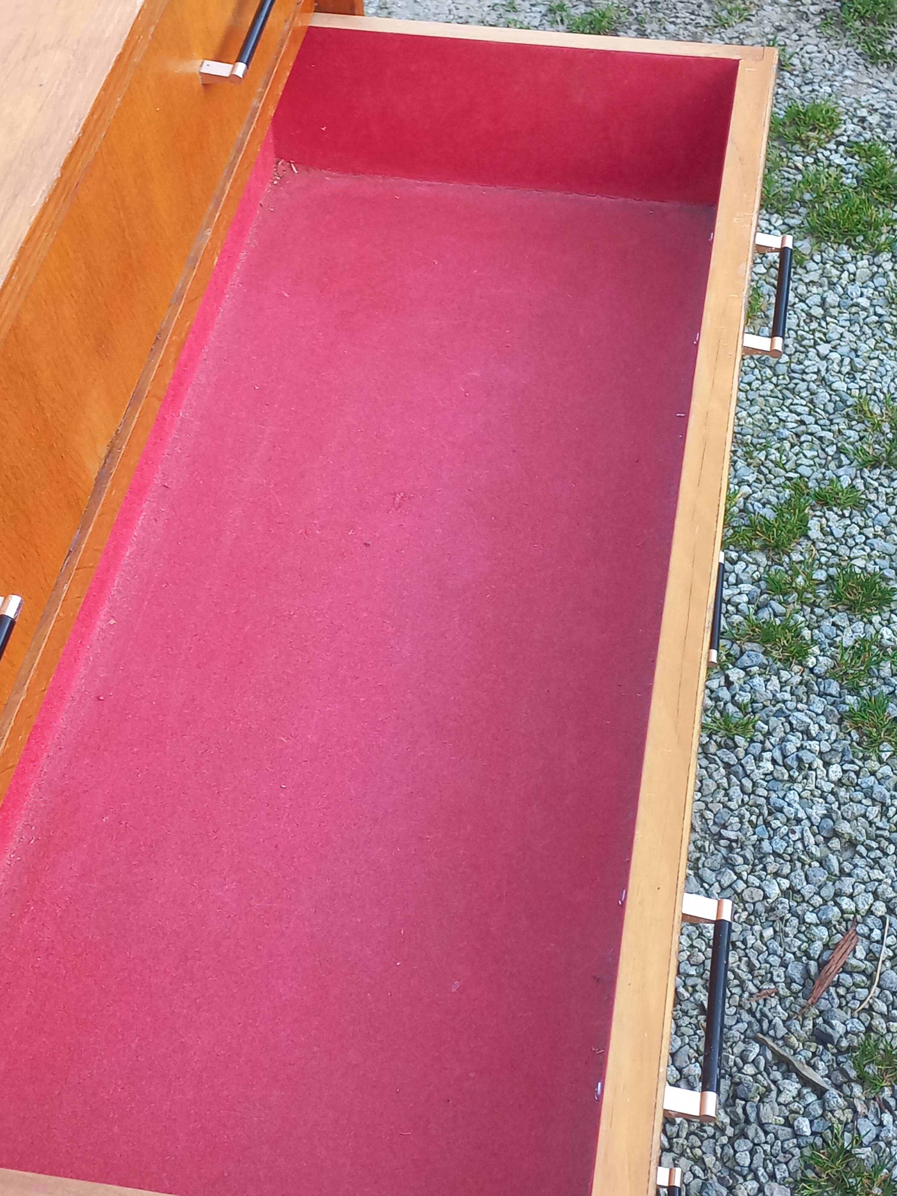 Vintage oak commode with tapered legs and wings from the 1950s.