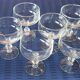 6 champagne or cocktail glasses in transparent glass in very good condition.