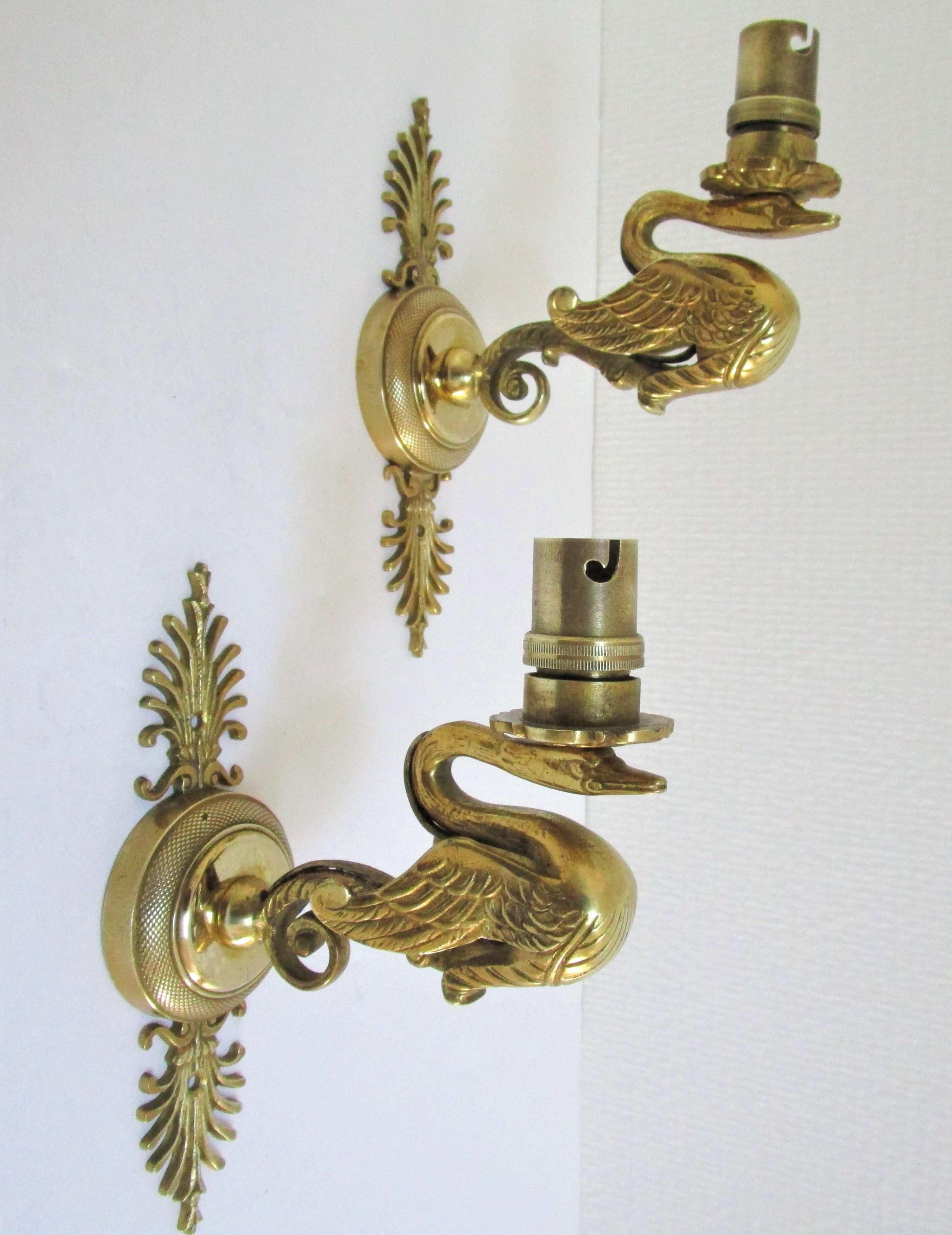 Pair of appliques swans gilded bronze patinated empire style