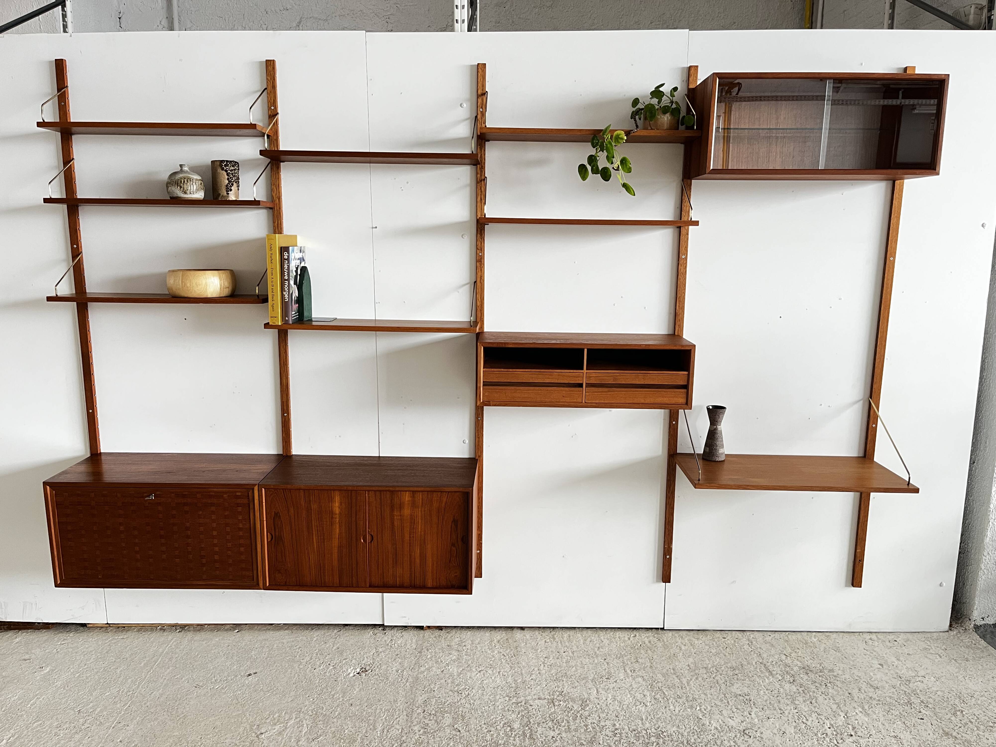 A wall unit with 4 compartments by Poul Cadovius, Denmark, 1960s.